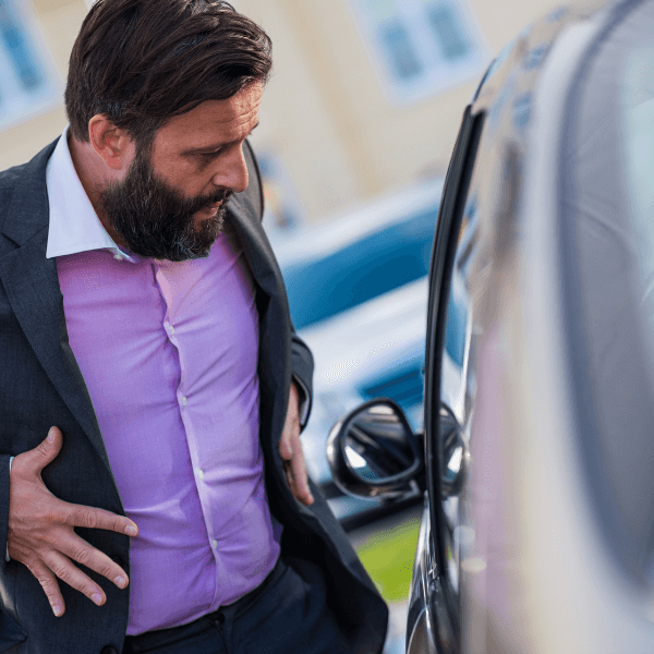 easy way to unlock door without key - The Importance Of Rekeying Your Locks After Losing Your Keys - man outside of car seems to be missing car keys